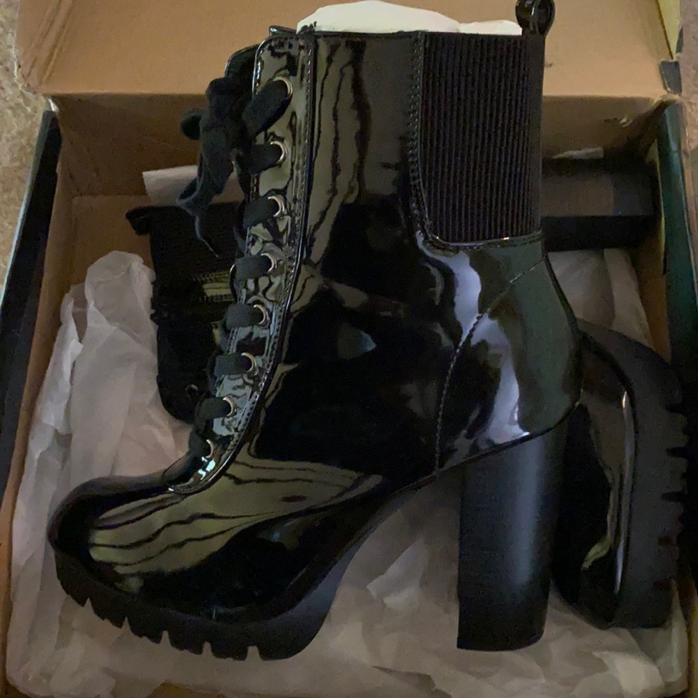 Black high heeled combat boots